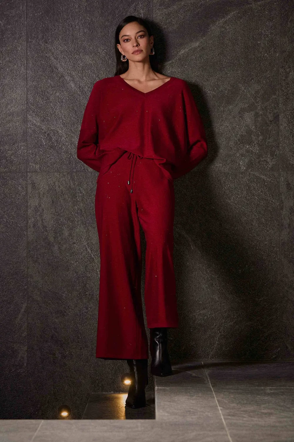 Model wearing a red dress