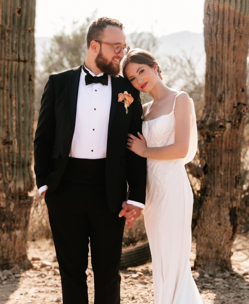 Photo of the smiling real bride and groom